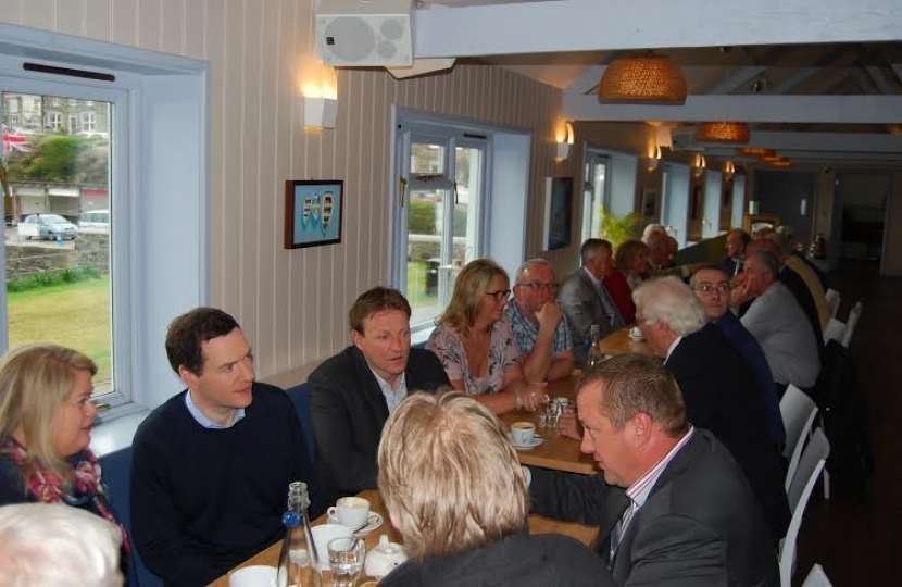  Photo George Osborne chats with local business owners with Derek  Thomas in Por