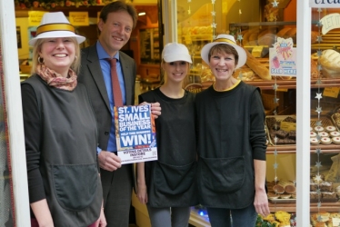 Derek with proprietor Amanda Neary and her team outside The Oven Door Bakery